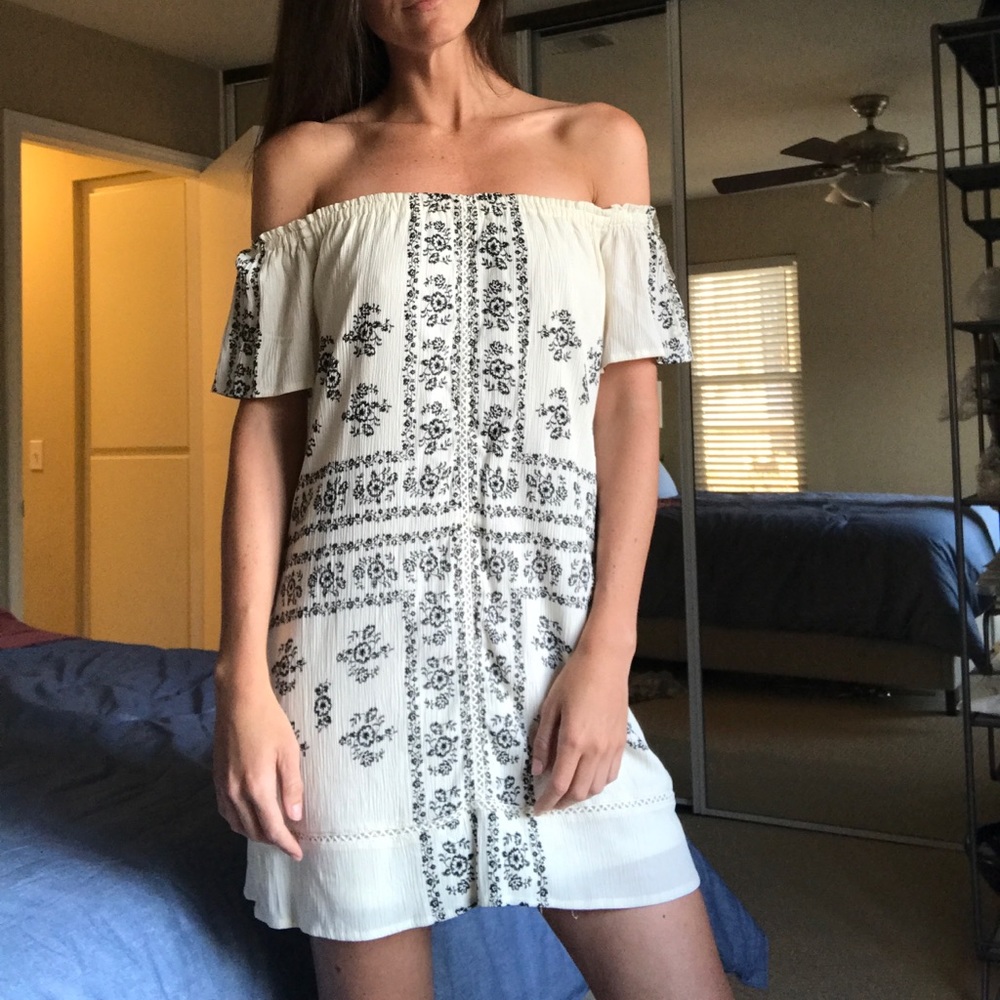 White/cream strapless dress with black florals